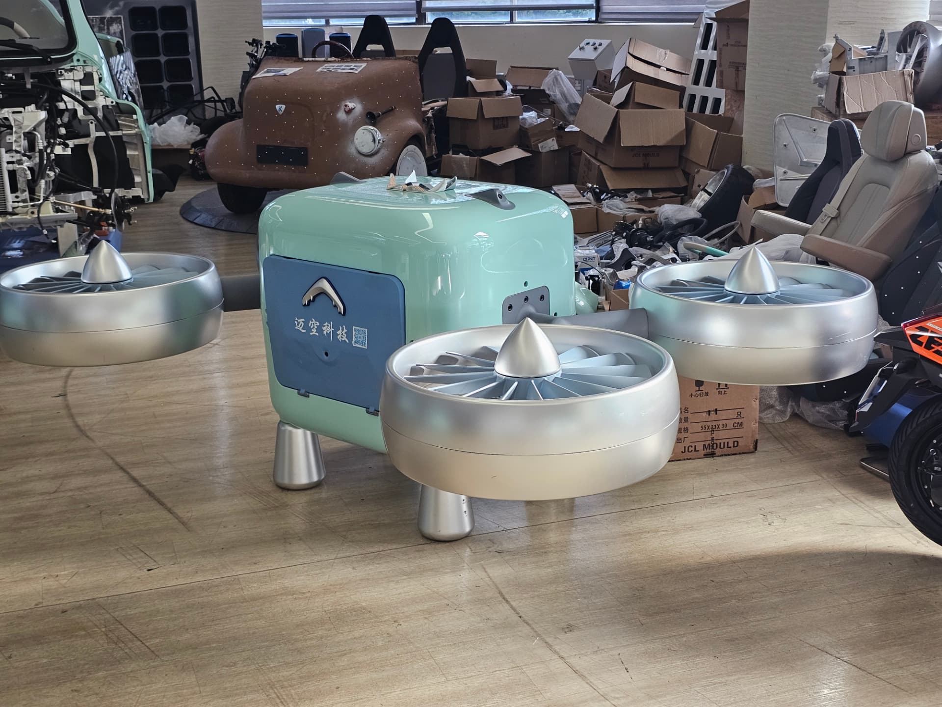 Moulded eVTOL drone body with ducted fan housings, China network